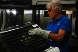 person in front of fortus 450mc printer